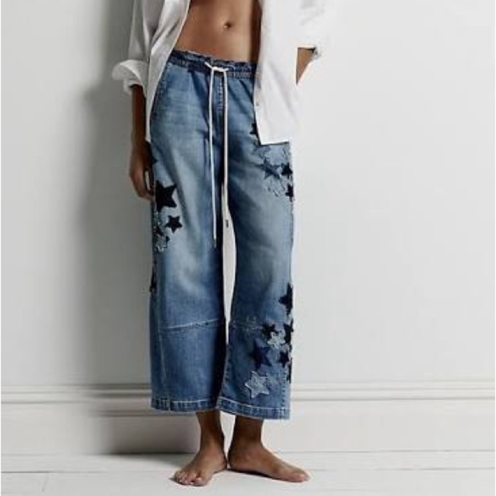 Anthropologie IZZIE relaxed pull on barrel
star appliqué jeans by Pilcro